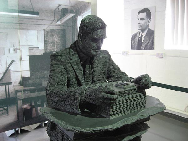 This photo shows a slate statue of Alan Turing found in Bletchley Park, England. Born in 1912, British mathematician Alan Turing is famous for his contributions to computer science, artificial intelligence, computational logic and cryptanalysis (code breaking).