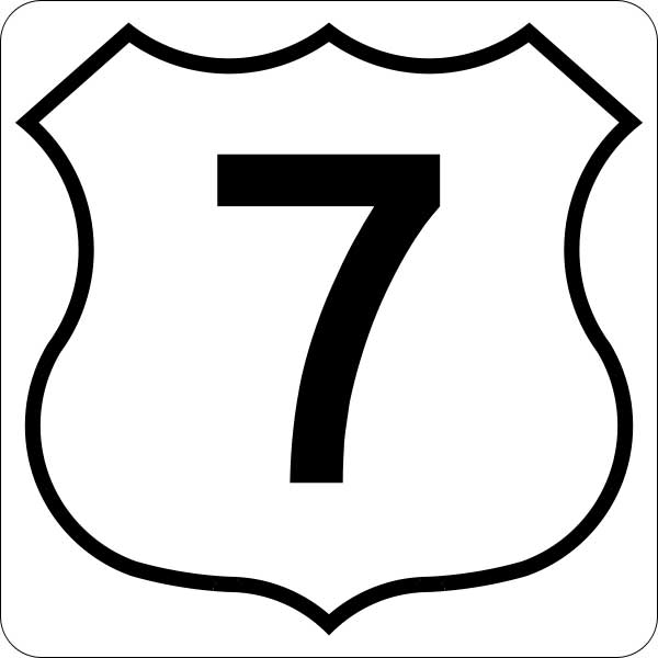This picture shows a black number 7 inside a badge symbol.