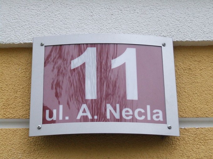 This photo shows the number 11 written on a plaque.