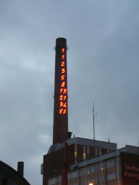 This picture shows Fibonacci numbers written on a tall smoke stack. This sequence of numbers is named after Italian mathematician Leonardo of Pisa (better known as Fibonacci), one of the great mathematicians of the Middle Ages.